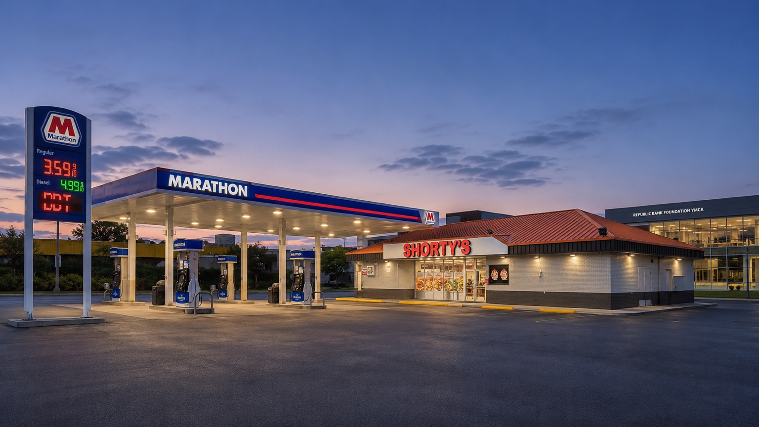 Shorty's #4 Marathon fuel canopy and convenience store lit at dusk
